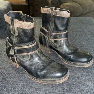 Distressed genuine leather side zip boot.